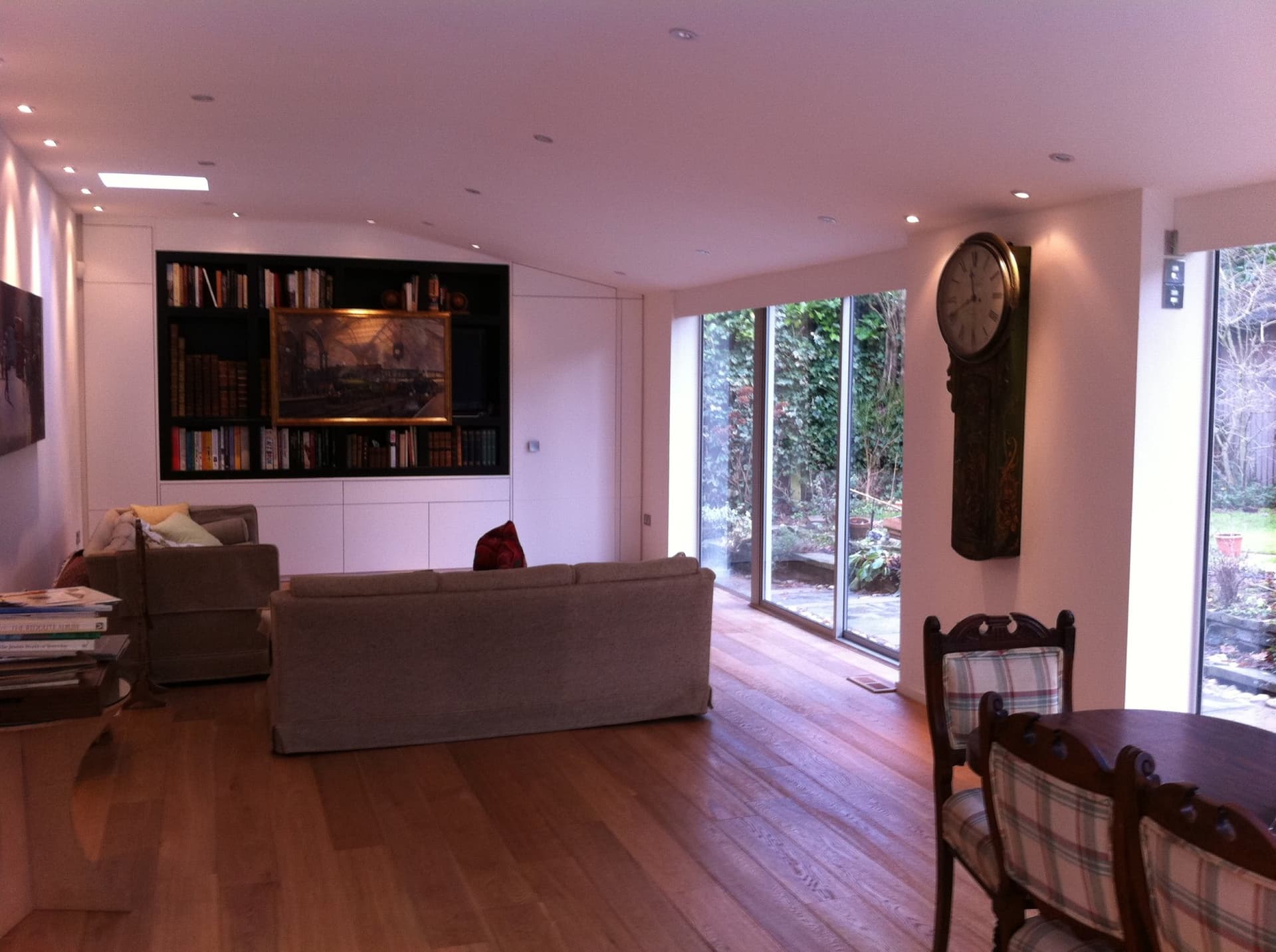 Living space inside the extension with built-in joinery and garden views