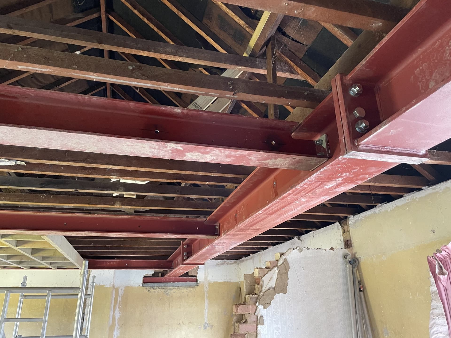 Structural steel beam installed to support the first floor above the new extension
