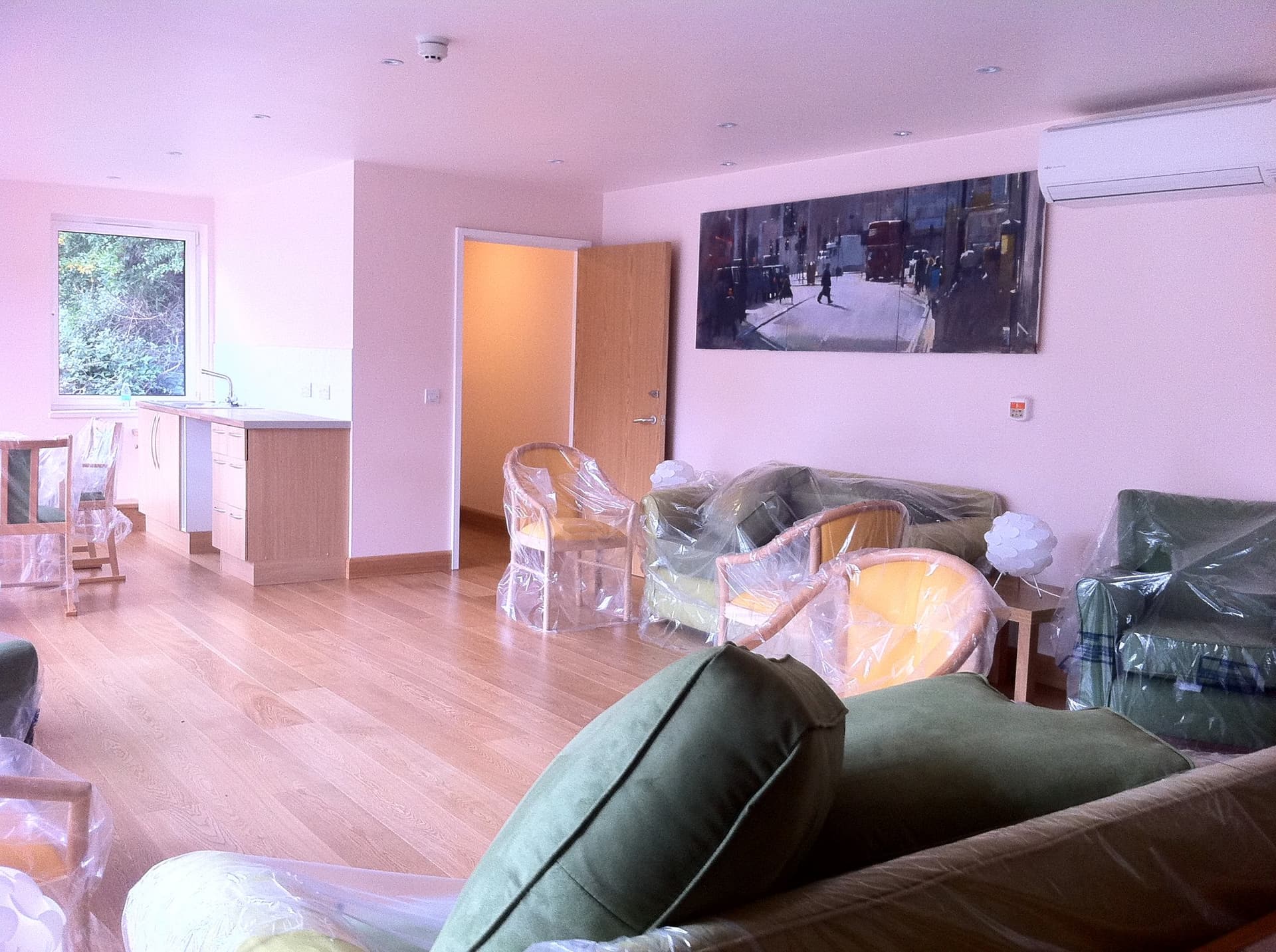 Interior of the day room extension with kitchenette and new furnishings