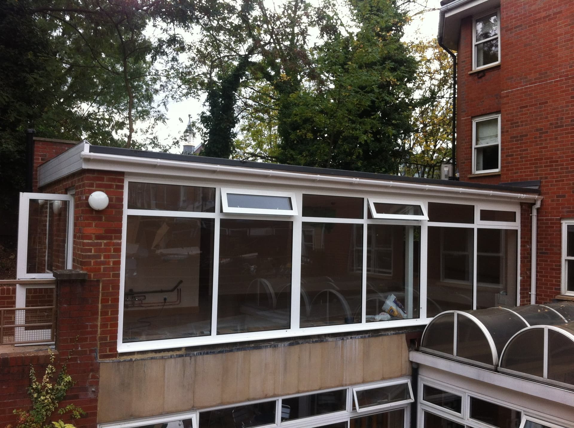 Exterior of a new glazed day room extension to a care home in Hampstead