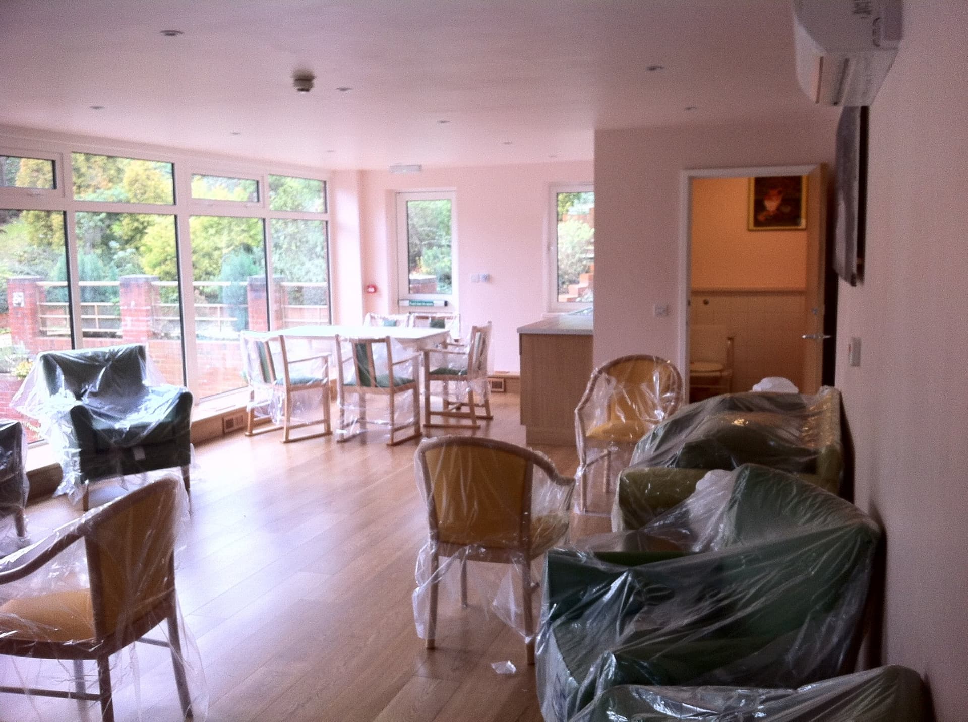 Lounge seating area within the extension overlooking the garden