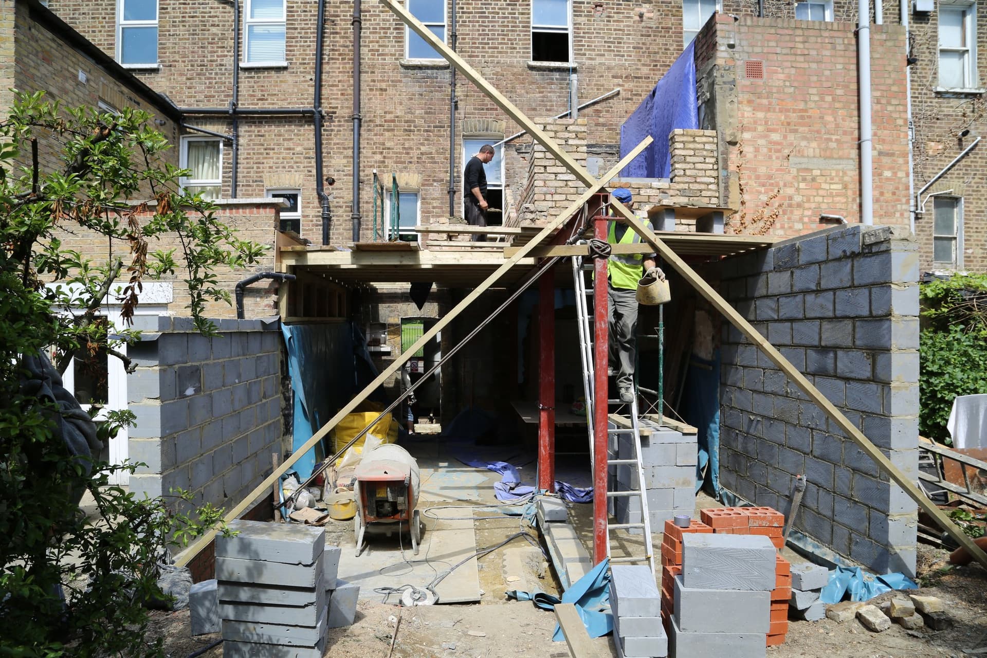 Structural steel frame and new blockwork walls during the rear extension build