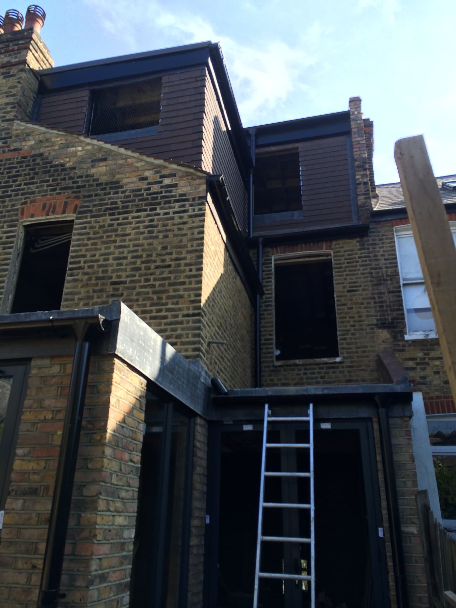 Close-up of the matched brickwork on the extension and dormer roof