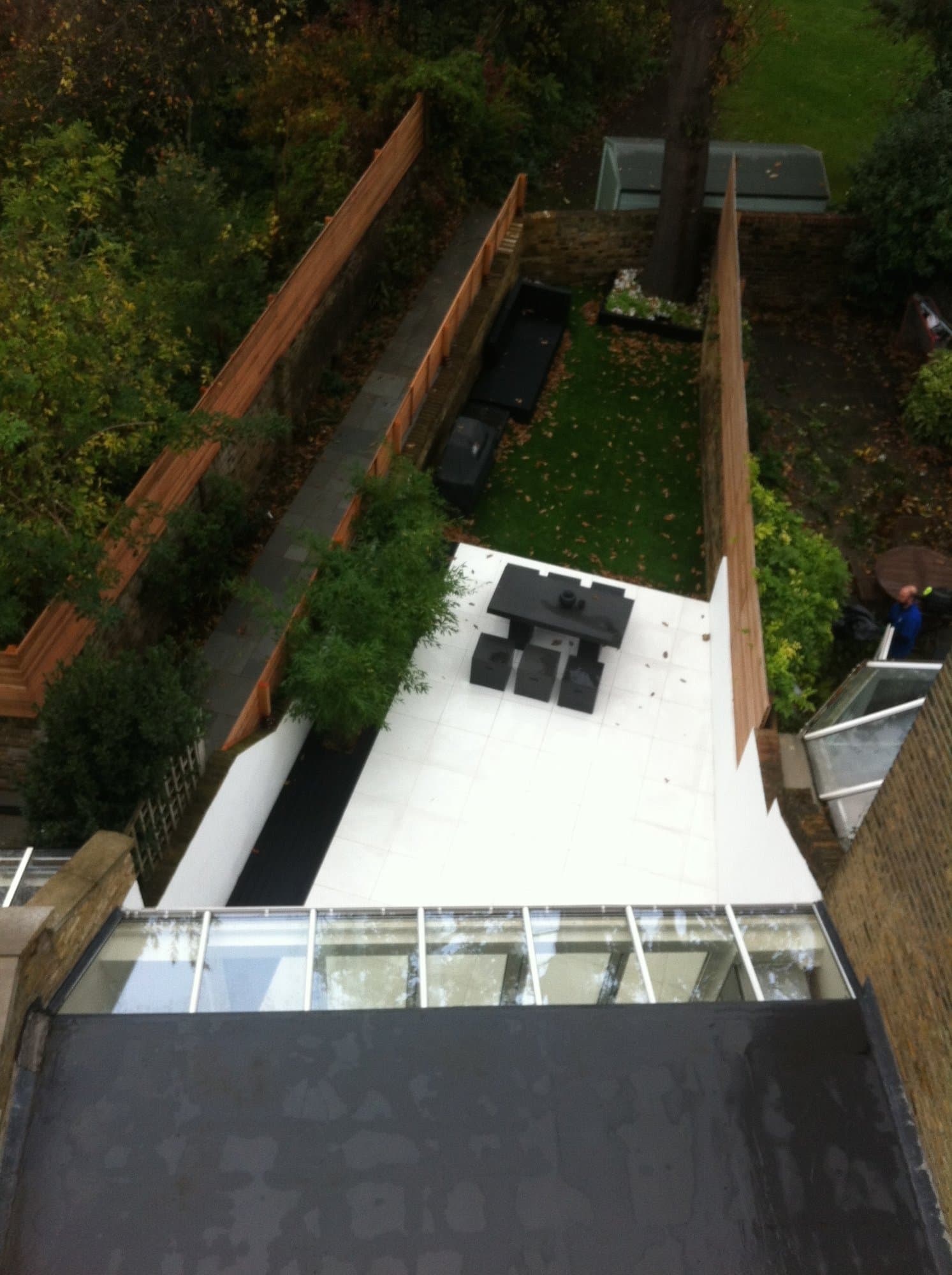 Aerial view from the loft showing the glazed roof extension and landscaped garden below
