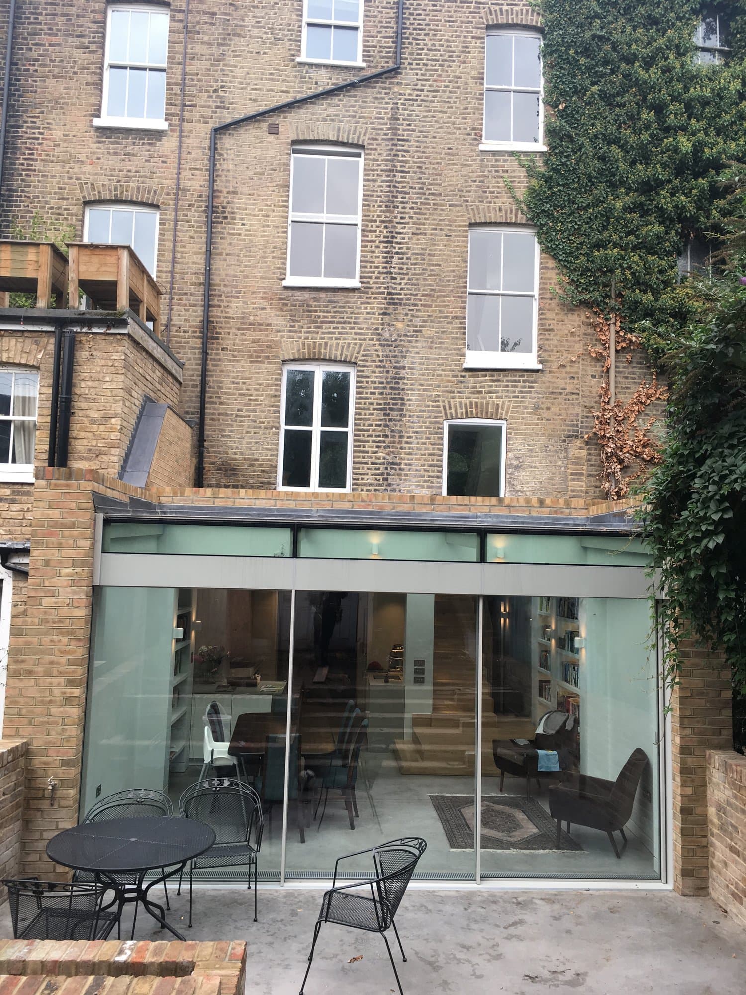Rear elevation of the renovated Victorian terrace with a full-height glazed extension