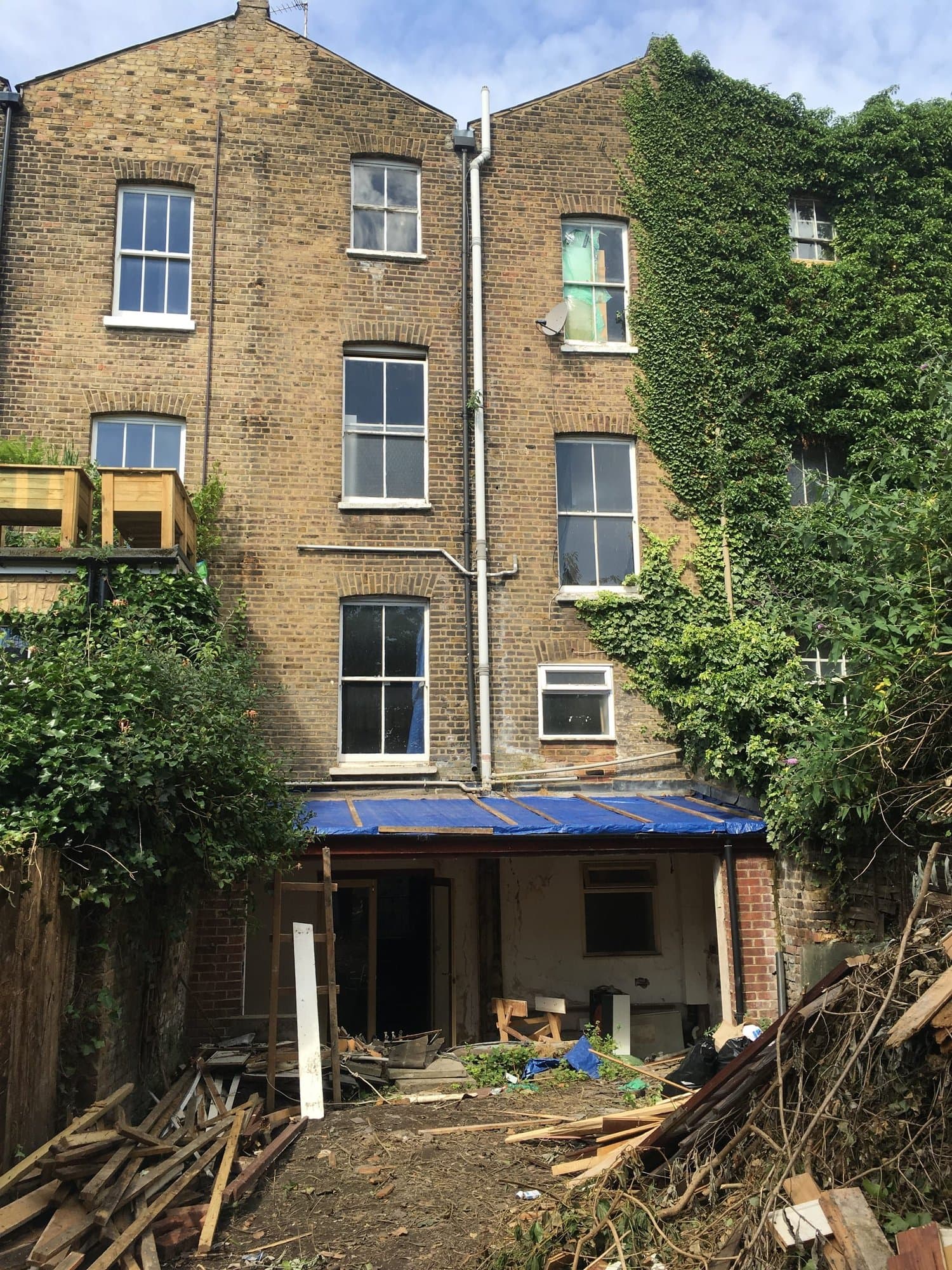 Rear of the property before renovation, mid strip-out