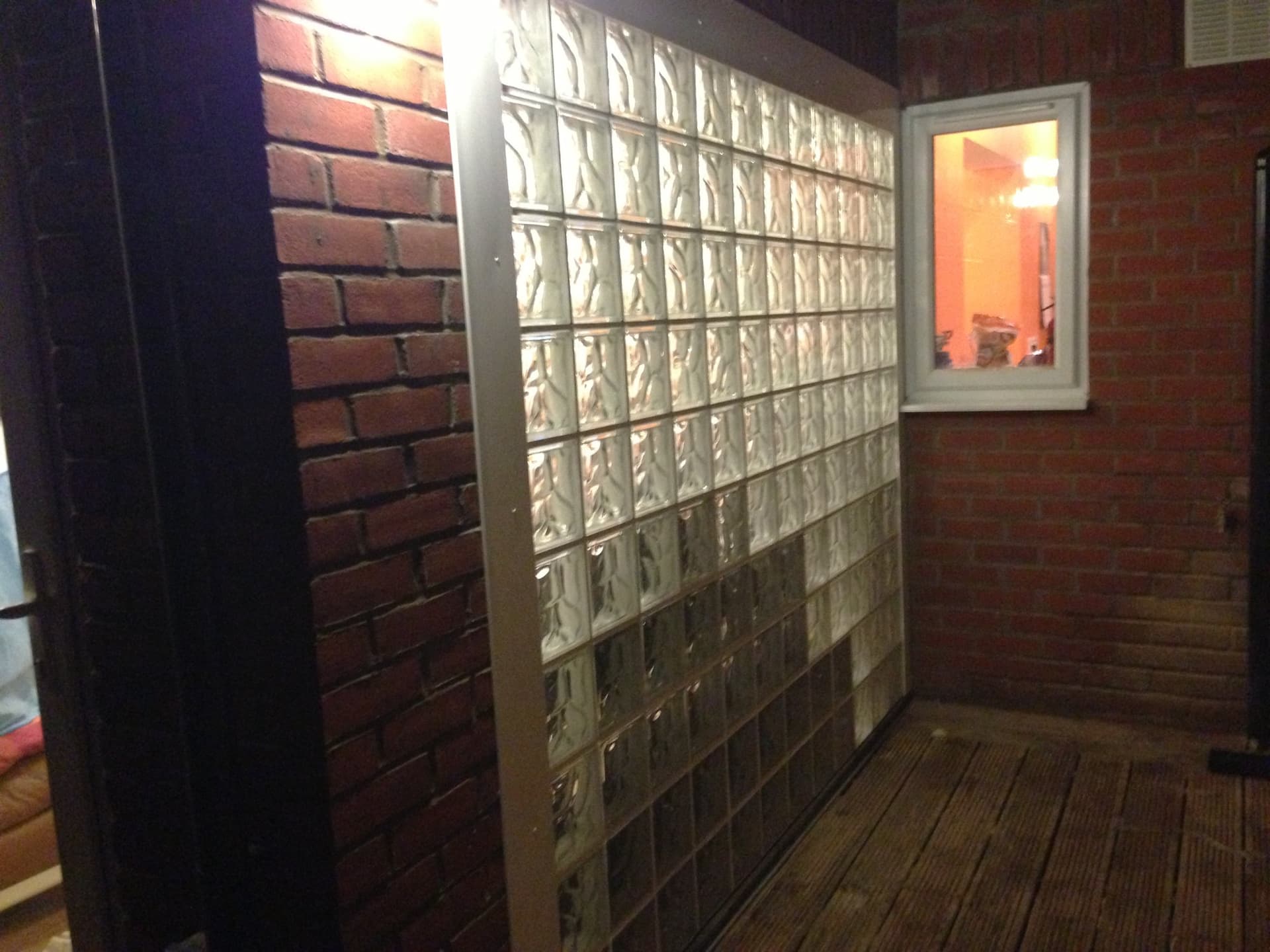External view of the glass block wall set into the brick side return
