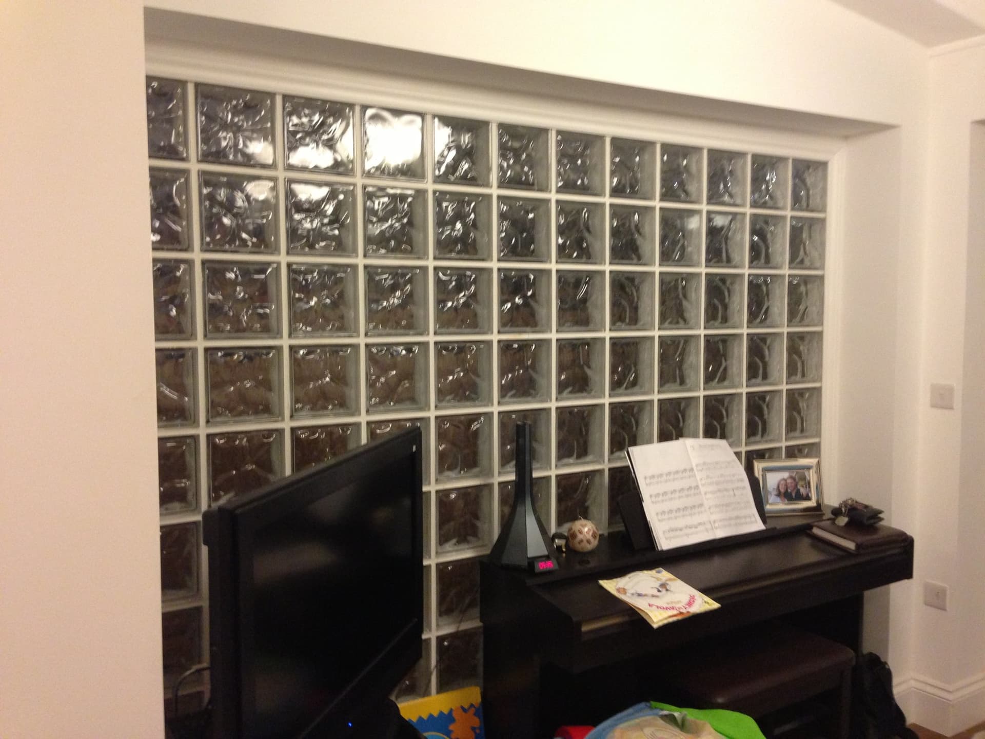 Glass block feature wall carried through to the reception room
