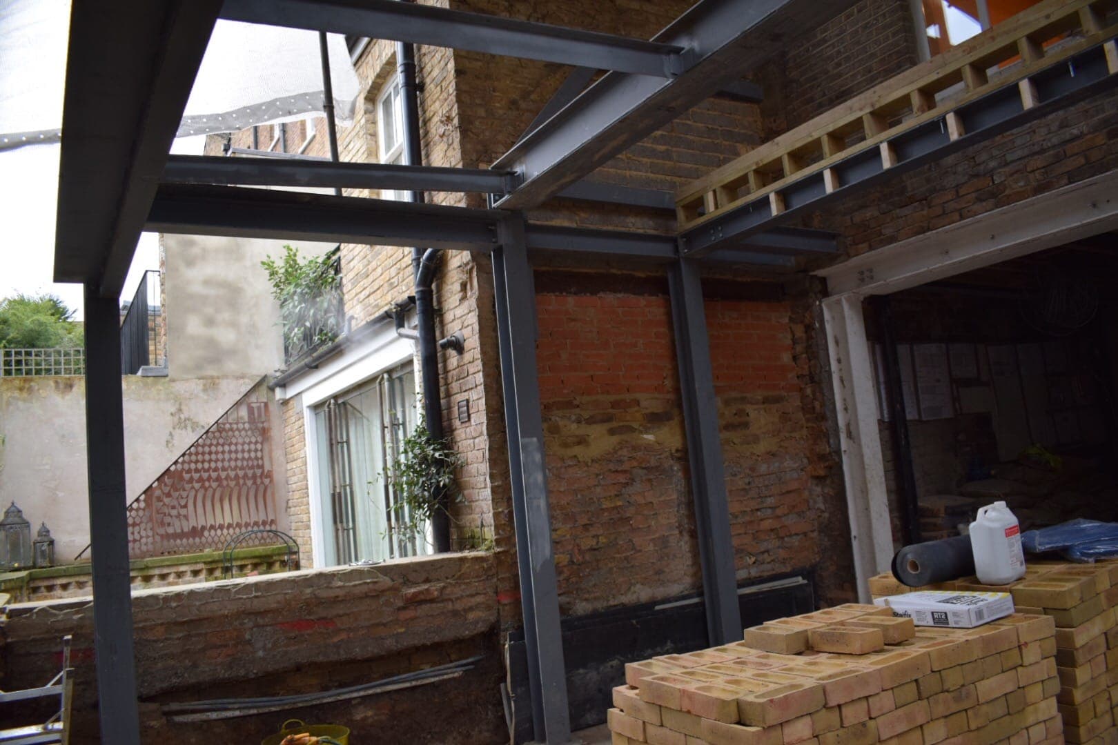 Structural steel frame installed during a TopBuild UK extension project in London